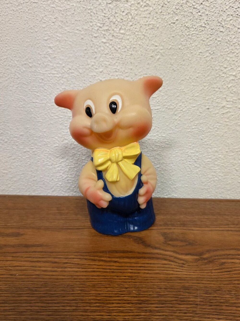Vintage 8" Rubber Pig Toy with Blue Overalls and Yellow Bow
